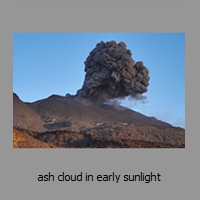 ash cloud in early sunlight